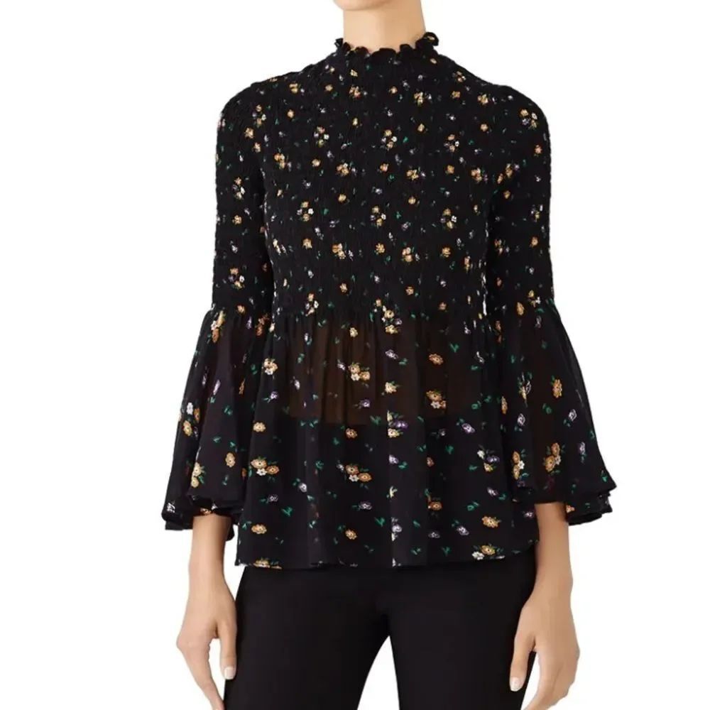 By Timo runched
Angel sleeve floral blouse size small